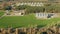 Aerial View Modern Granary, Grain-drying Complex, Commercial Grain Or Seed Silos In Rural Landscape. Corn Dryer, Inland