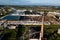 Aerial view of modern large industrial factory with smokestack,