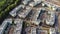 Aerial view on modern residential homes near forest edge