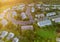 Aerial view of modern roofs of houses early sunrise