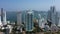 Aerial view of modern skyscrapers, business apartments, hotels in Cartagena, Colombia. Vertical pan from right to left.