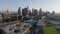 Aerial view of modern urban district at sunset. Group of high rise office buildings in business area. Los Angeles