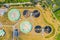 Aerial view of modern water cleaning facility at urban wastewater treatment plant. Purification process of removing undesirable