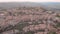 Aerial view of Montalcino town with old brick houses.