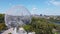 Aerial view of Montreal Biosphere and downtown city skyline in summer sunny day