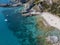 Aerial view of moored boats floating on a transparent sea. Scuba diving and summer holidays. Capo Vaticano, Calabria, Italy