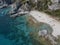 Aerial view of moored boats floating on a transparent sea. Scuba diving and summer holidays. Capo Vaticano, Calabria, Italy