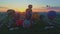 Aerial View of a Morning Launch of Hot Air Balloons at a Hot Air Balloon Festival at Sunrise on a Sunny Summer Day