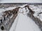 Aerial view of Moscow s Central shipping channel in winter. River covered in snow and ice on sunny day