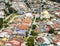 Aerial view of mosque surrounded by colourful neighbourhood in s