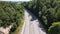 Aerial view of motorbike accelerating away summertime