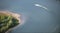 Aerial View : Motorboat waterskiing on a lake