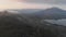 Aerial view of mount Batur and lake Batur in the evening with the evaporation of clouds.