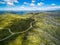 Aerial view of Mount McKay and Rocky Valley water storage with winding unsealed road.