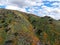 Aerial view of Mountain with California Golden Poppy and Goldfields blooming in Walker Canyon, Lake Elsinore, CA. USA.