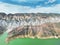 Aerial view on mountain lake. Drone view water reservoir at mountain valley. Beautiful view from above on smooth blue surface of