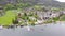 Aerial view of mountain lake Wolfgangsee with houses of resort town in Austria, Alps