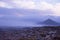 Aerial view of mountain in the morning. Mountains in fog and clouds with stones and rocks foreground.