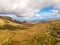 Aerial view of the mountain pass road on the top of Quiraing from Uig to Staffin - Isle of Skye, Scotland