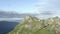 Aerial view mountain peak panorama flight surrounded by cloudy weather