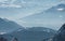 Aerial view of mountain range on Austria-Germany border on foggy day