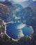 Aerial view of mountain range and small glacial lake in Vancouver, British Columbia, Canada