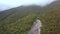 Aerial View Mountain River Runs along Plain Stone Canyon Part