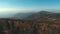 Aerial view of mountains. Departure from a mountain hill. Siberia.