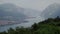Aerial view of the mountains off the coast of Italy, Lake Como in the fog