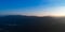 Aerial view of the mountains at sunrise. Beautiful panorama land