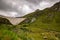 Aerial view of mountainscape below Lac de Moiry in the Swiss Alps. CH Switzerland