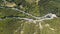 Aerial view of the movement of vehicles on a serpentine mountain road. Croatia