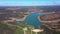 Aerial view moving sideways. Drone photography over the Bravura dam and reservoir. Low levels of southern water supplies