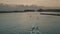 Aerial view of moving small sailboats near Anzio in the evening, Italy