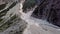 Aerial view of the mudflow with snow high in the Alpine mountains