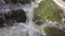 Aerial view of the mudflow with snow high in the Alpine mountains