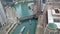 Aerial view of multiple large tour boats causing Chicago River congestion near Wolf Point construction
