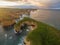 Aerial view of Mutton Bird Island arches at sunrise