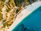 Aerial view of Myrtos beach, the most famous and beautiful beach of Kefalonia, a large coast with turqoise water and white coarse