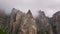 Aerial view of mystical rocks high in the mountains. Clouds on the rocks. natural video background