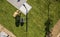 Aerial View of Natural Grass Turfs Installation in a Backyard Garden