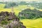 Aerial view of natural karst towers among yellow rice fields