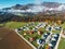 Aerial view of new housing development by the forest in the suburbs