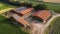 Aerial View of a New Pigsty Construction Promoting Animal Welfare, Equipped with a Biogas Plant and Rooftop PV Systems