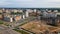 Aerial view of the new urban development. New houses are being built. The cranes are visible