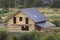 Aerial view of new wooden ecological traditional house cottage of natural lumber materials with attic floor, porch, balcony and