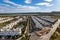 Aerial view newly built residential buildings with swimming pools. Spain