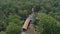 Aerial View of a Newly Rebuilt Covered Bridge by Restored Rail Road Tracks