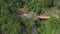 Aerial View of a Newly Rebuilt Covered Bridge by Restored Rail Road Tracks