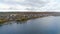 Aerial view nice cottage town on large tranquil lake bank